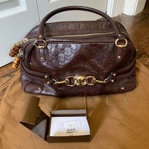Gucci guccissima leather wave boston bag